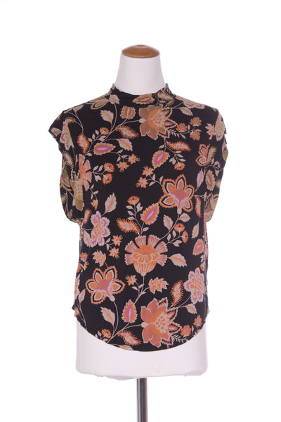 FREE PEOPLE - High neck open back floral top! 14