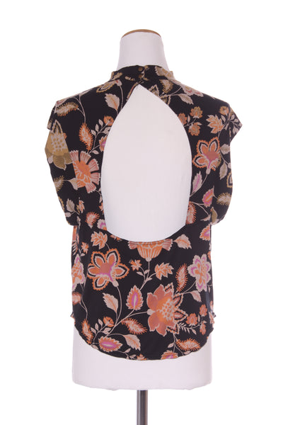 FREE PEOPLE - High neck open back floral top! 14